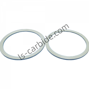 Tungsten carbide sealing rings for sealing corrosive liquids